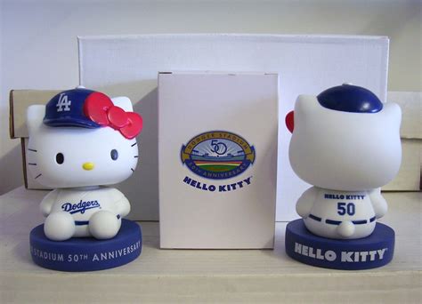 Hello Kitty with Dodgers Logo Coffee Tumbler Collectible Blue Coffee Holds 12 oz. . Dodgers hello kitty bobblehead